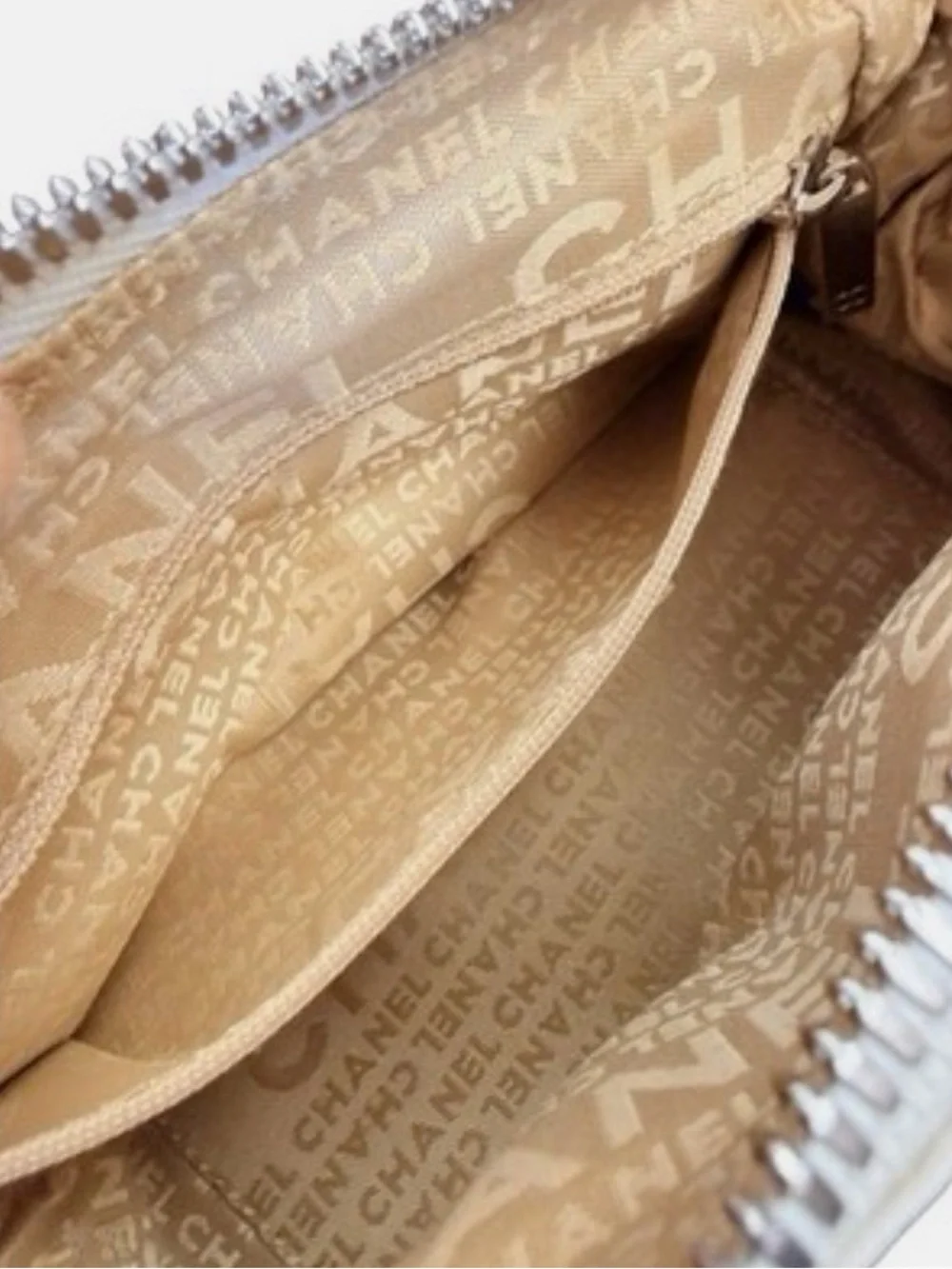 CHANEL Cream Pebbled Leather Bowler with Tassel